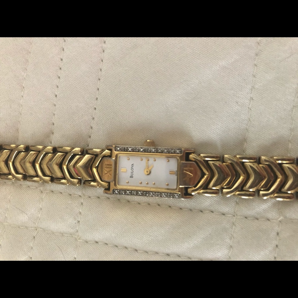 Bulova watch- gold with diamonds
